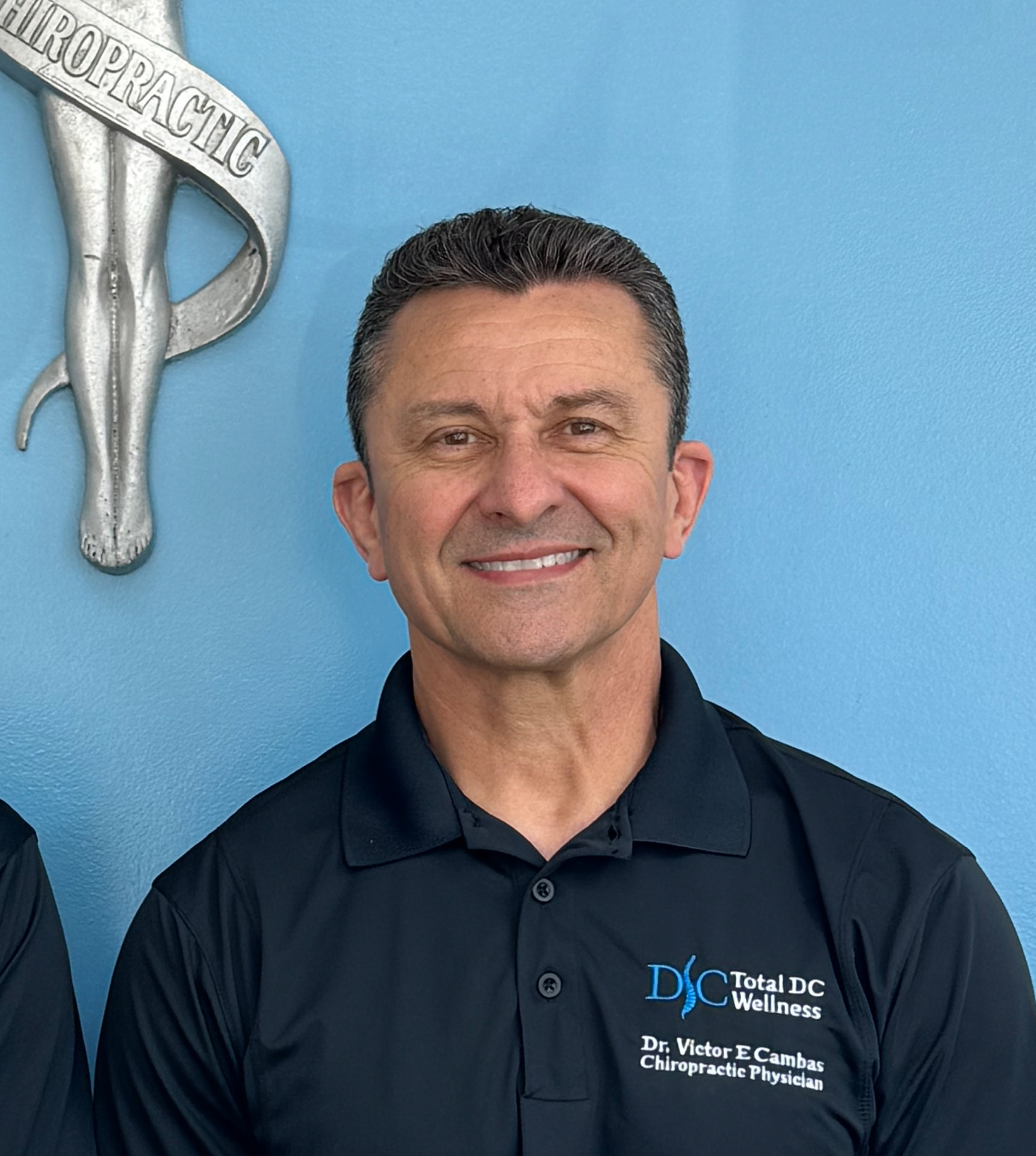 Portrait of Dr. Victor Eduardo Cambas, Doctor of Chiropractic at Total DC Wellness